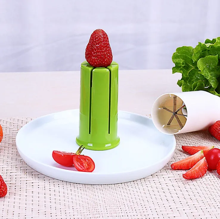 White vegetable cutter with stainless steel blades for slicing cucumbers carrots and strawberries