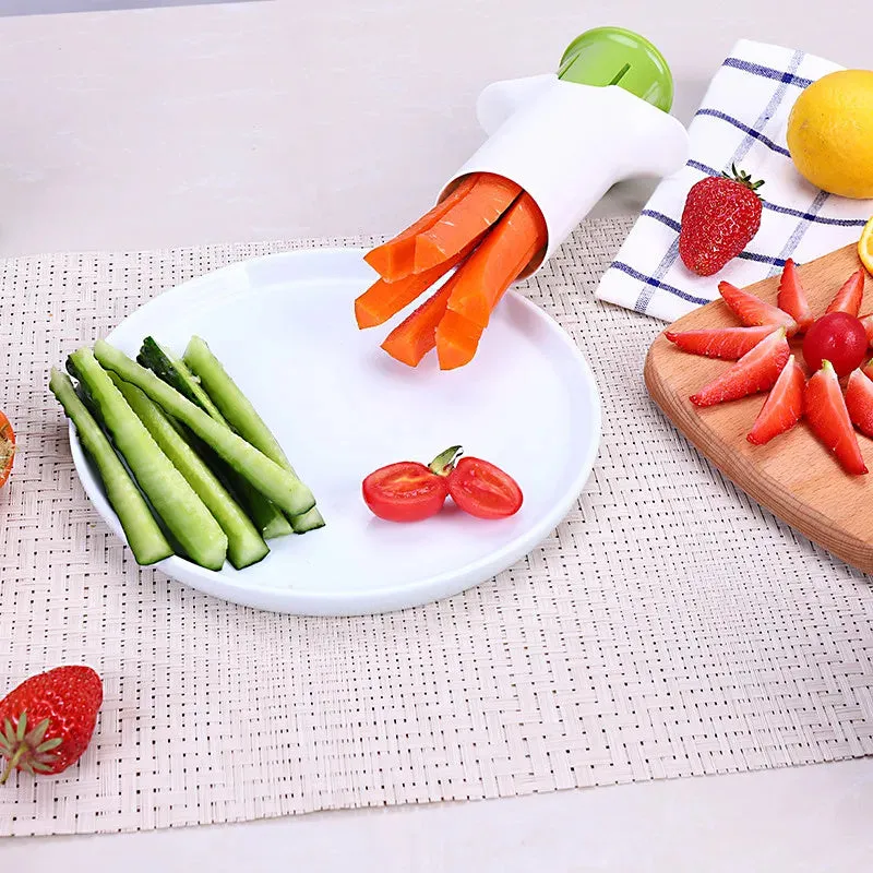 White vegetable cutter with stainless steel blades for slicing cucumbers carrots and strawberries