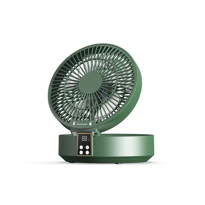 White portable folding electric fan with night light and remote control on a desk