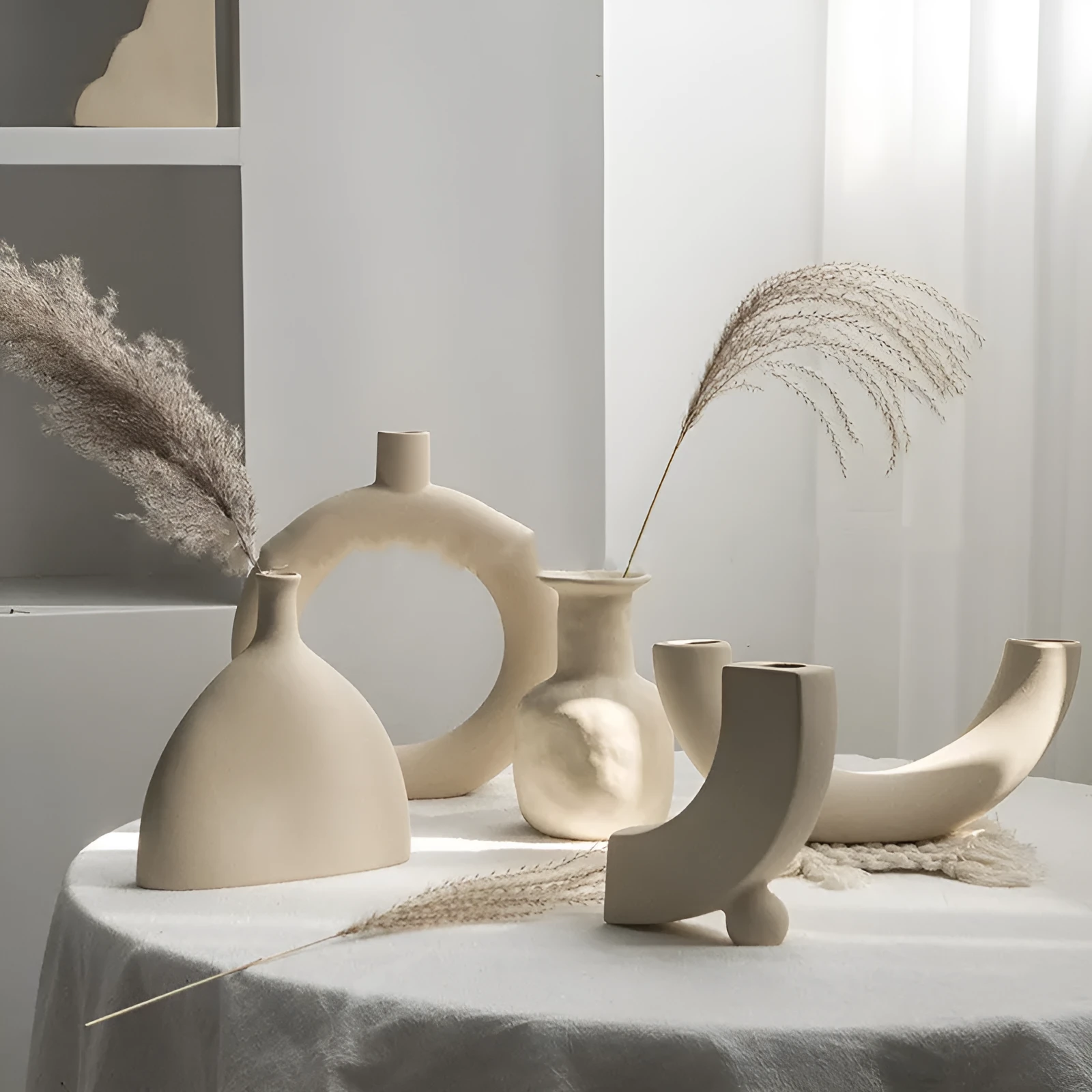 Unglazed matte ceramic vase for dry flower arrangements with textured finish