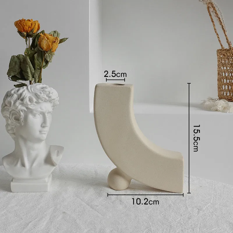 Unglazed matte ceramic vase for dry flower arrangements with textured finish