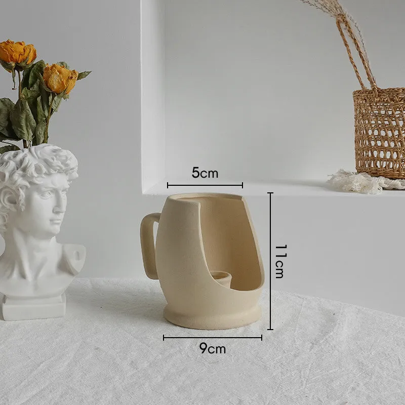 Unglazed matte ceramic vase for dry flower arrangements with textured finish