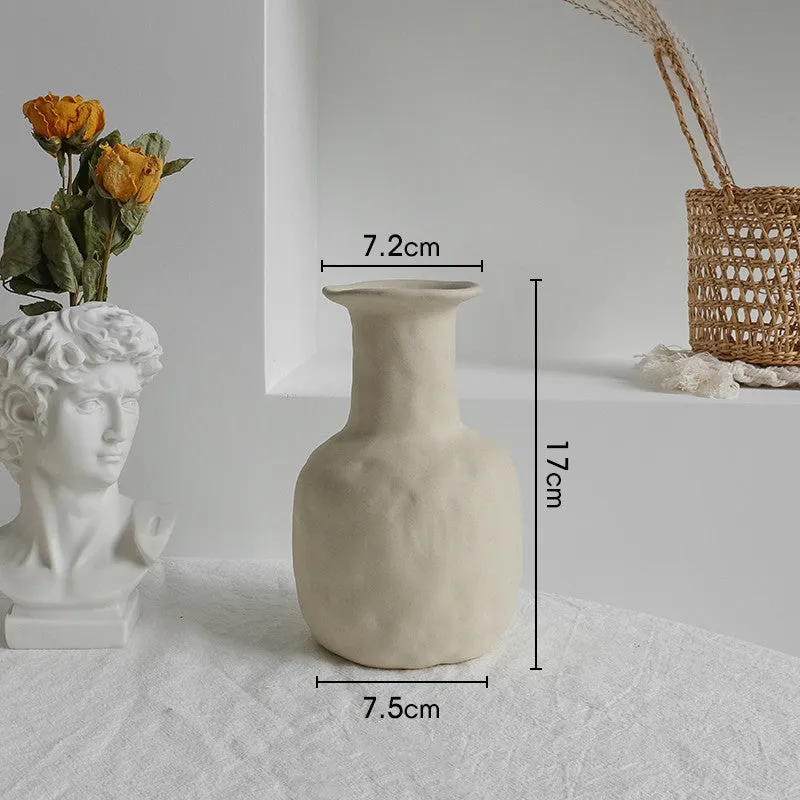 Unglazed matte ceramic vase for dry flower arrangements with textured finish