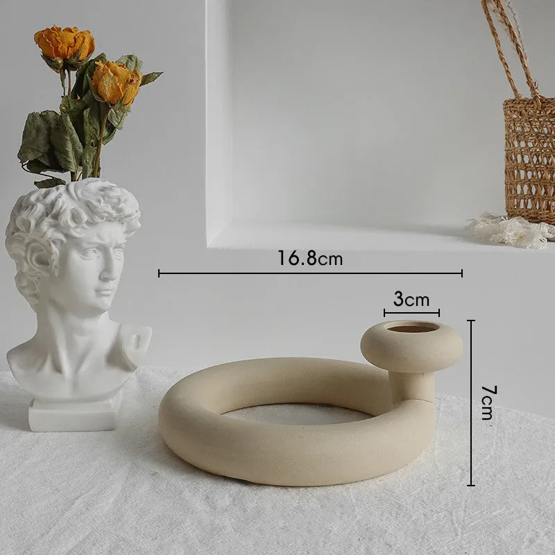 Unglazed matte ceramic vase for dry flower arrangements with textured finish
