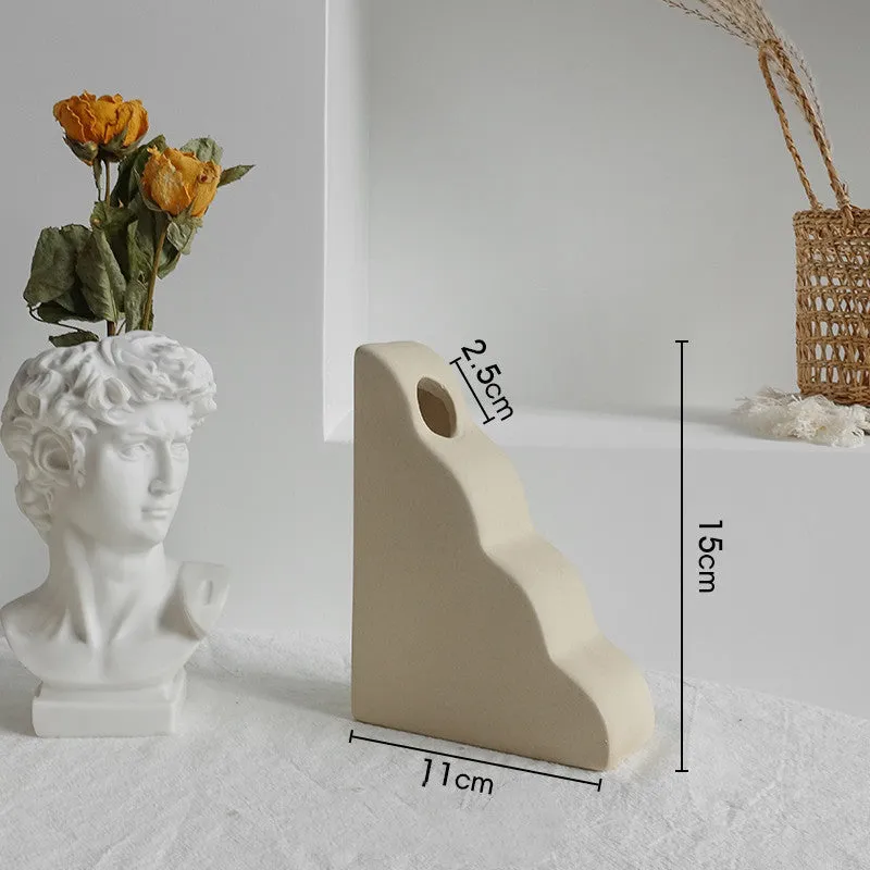 Unglazed matte ceramic vase for dry flower arrangements with textured finish
