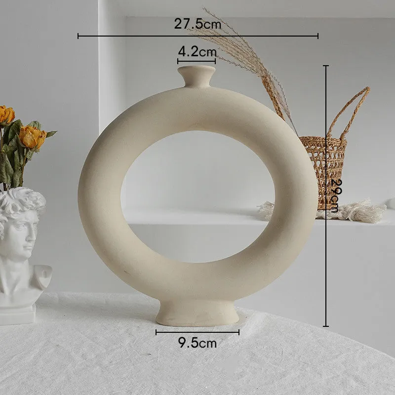Unglazed matte ceramic vase for dry flower arrangements with textured finish