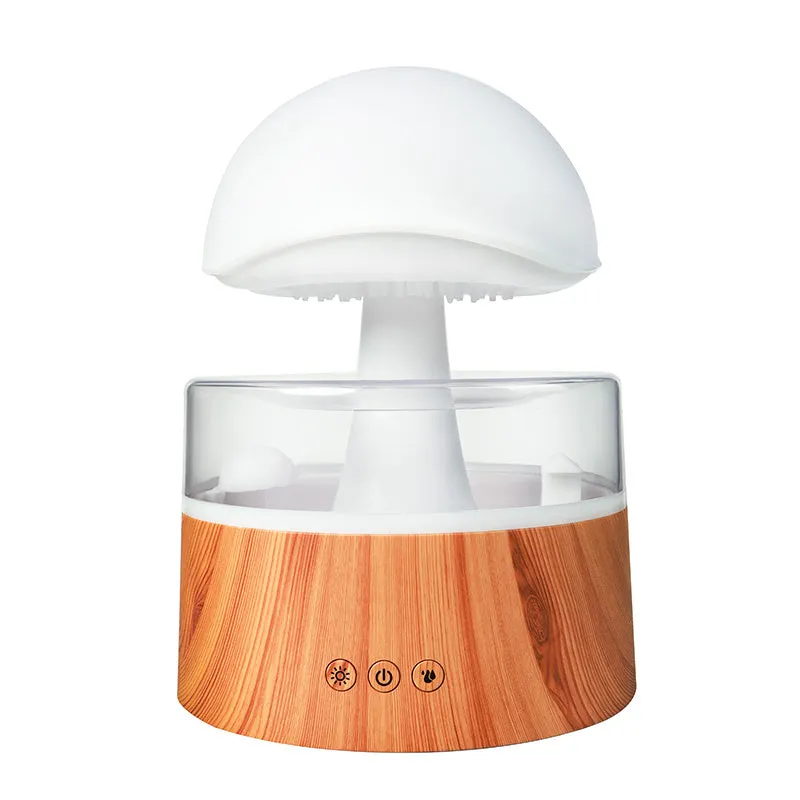 White cloud-shaped ultrasonic humidifier producing rainfall mist with colour-changing night light effects