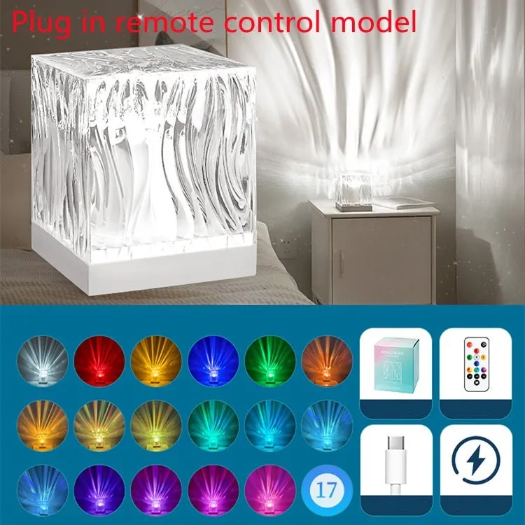USB rechargeable crystal table lamp projecting blue water ripple light pattern on wall.