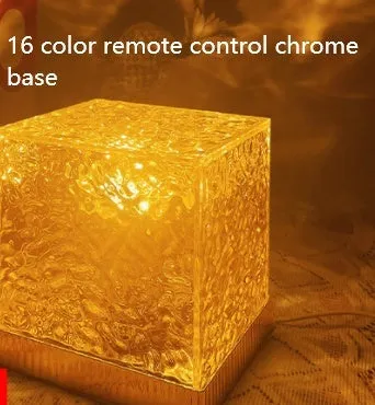 USB rechargeable crystal table lamp projecting blue water ripple light pattern on wall.