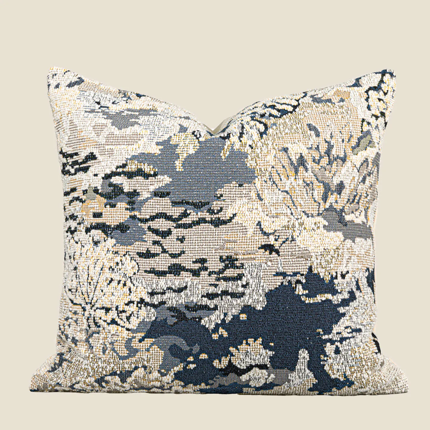 Blue floral antique pattern wool blend cushion cover and feather velvet pillow on a sofa.