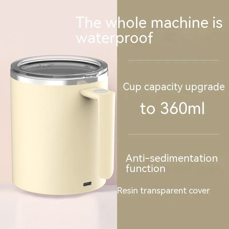 White automatic stirring coffee cup with rechargeable base on a table.