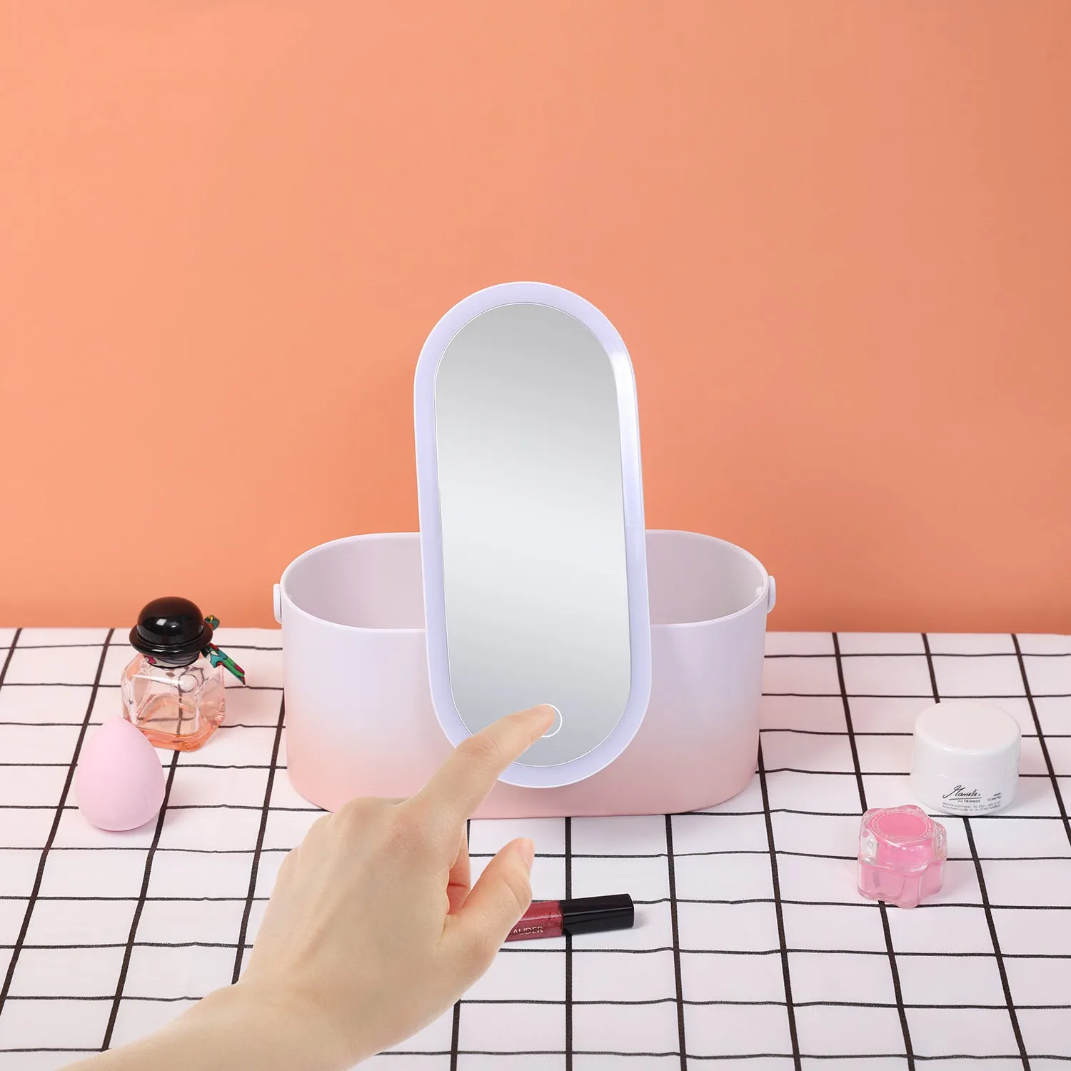 Pink gradient LED makeup mirror storage box with open compartments showing mirror and storage space