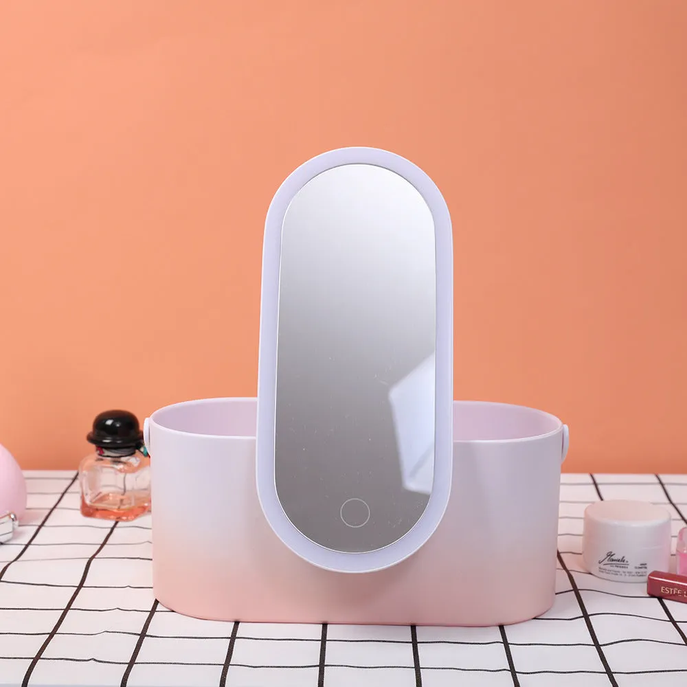 Pink gradient LED makeup mirror storage box with open compartments showing mirror and storage space