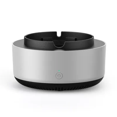 Grey intelligent electronic air purifier ashtray on a table with cigarette
