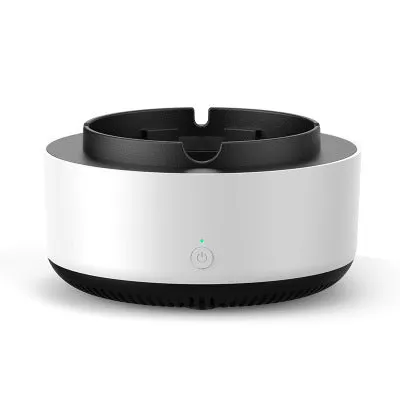 Grey intelligent electronic air purifier ashtray on a table with cigarette