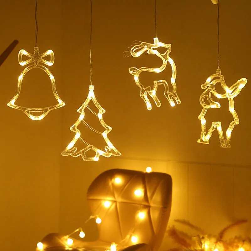 Battery-powered Christmas LED chandelier light with suction cups, showing Santa Claus design.