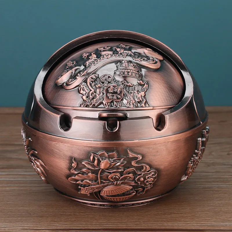 Bronze alloy ashtray with decorative fortune tree design and smoke extinguishing slot.