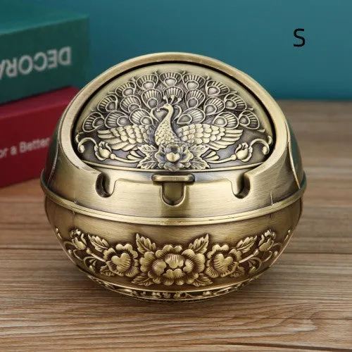 Bronze alloy ashtray with decorative fortune tree design and smoke extinguishing slot.