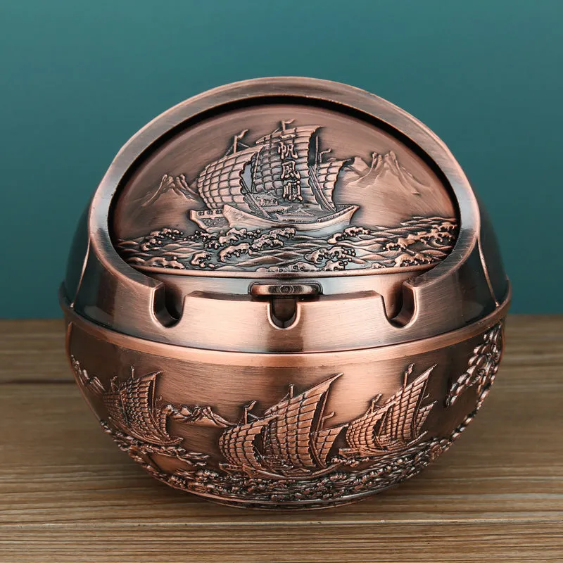 Bronze alloy ashtray with decorative fortune tree design and smoke extinguishing slot.