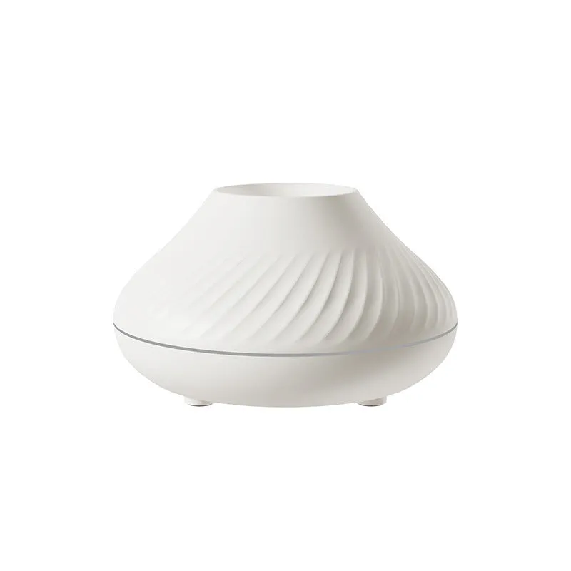 Beige USB aroma diffuser essential oil lamp with flame effect lighting on wooden surface