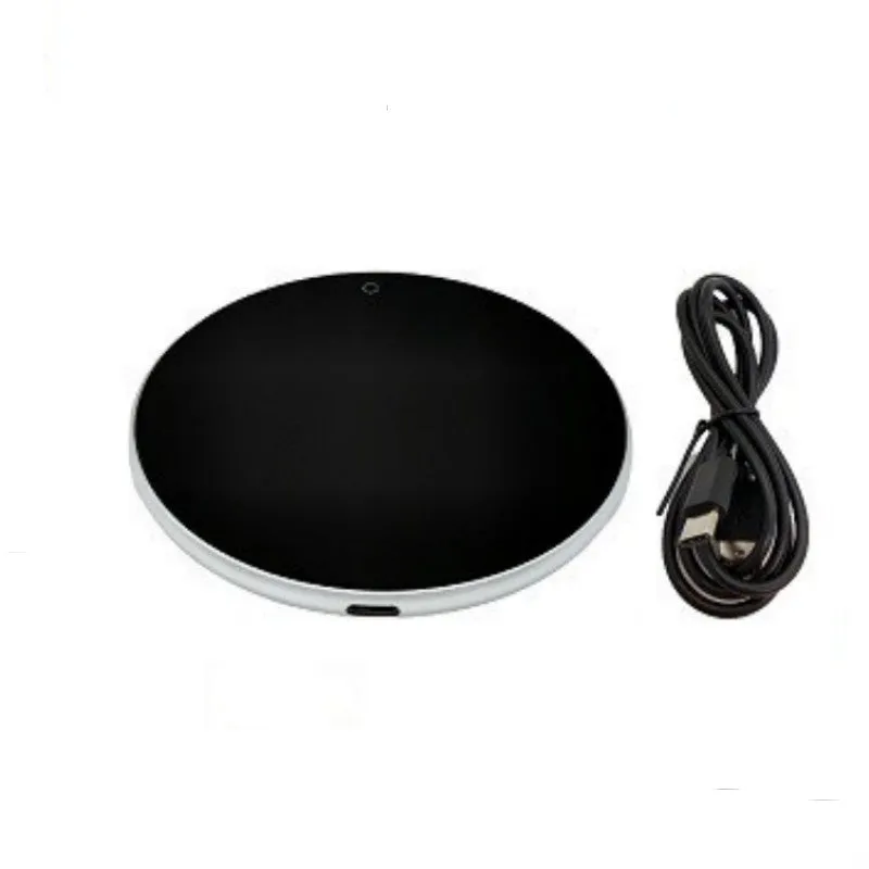 Black USB heating coaster pad for keeping mugs and cups warm on a desk