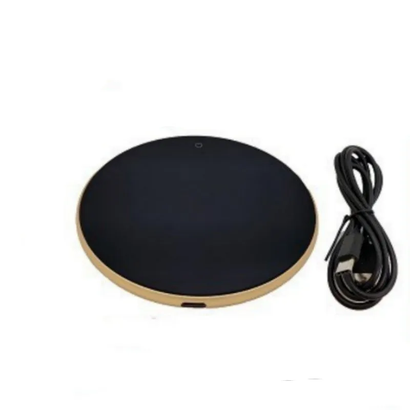 Black USB heating coaster pad for keeping mugs and cups warm on a desk