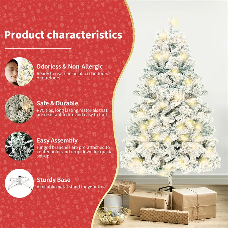 Green and white snow-dusted artificial PVC Christmas tree on a metal stand.