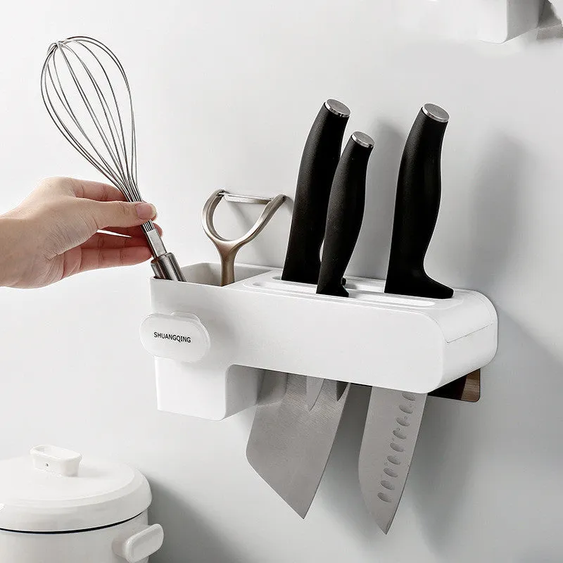 White plastic kitchen knife rack on countertop with dimensions 26 cm height
