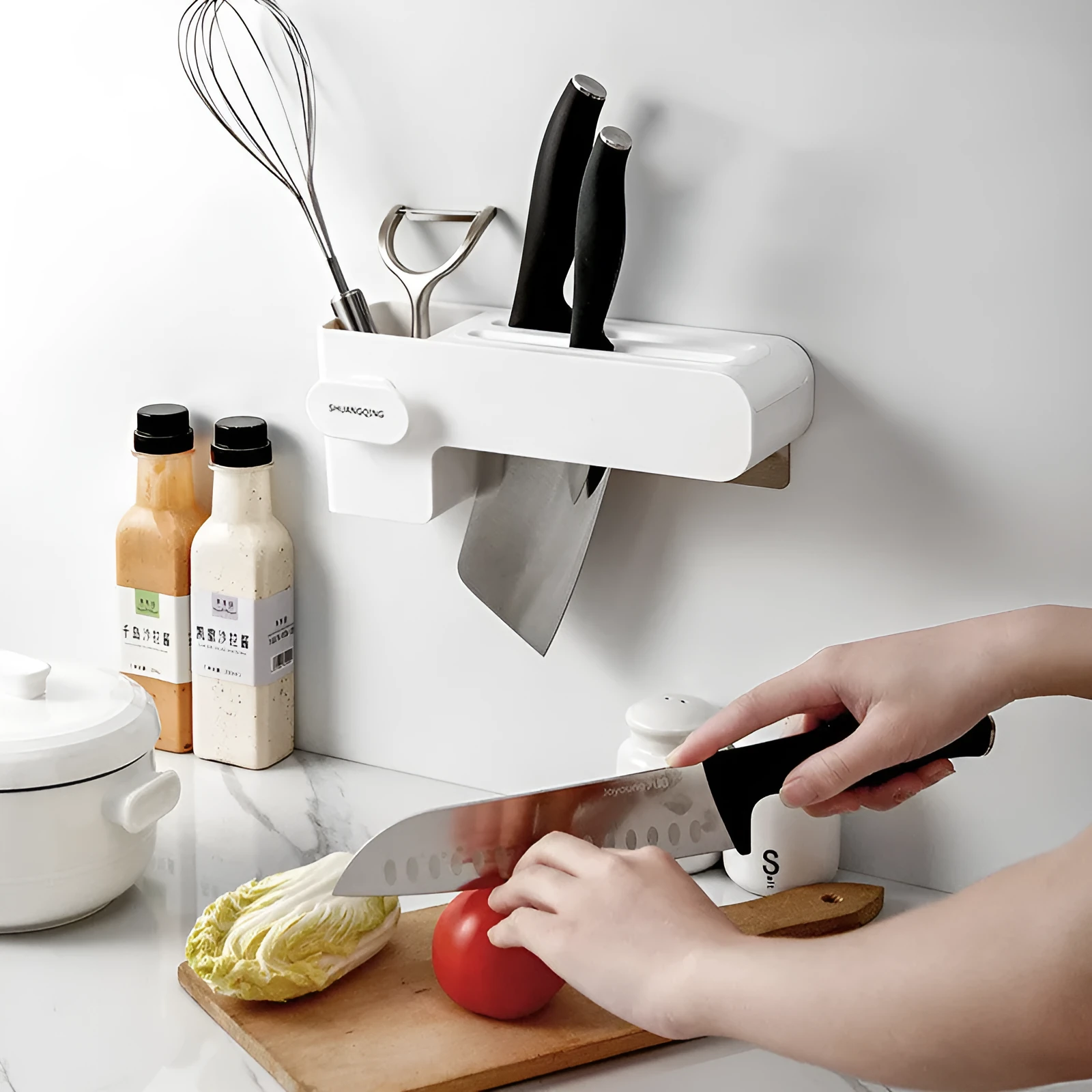 White plastic kitchen knife rack on countertop with dimensions 26 cm height