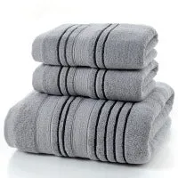 100% cotton bath towel set with one large towel and two hand towels in neutral colours