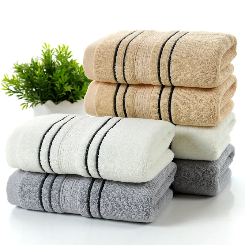 100% cotton bath towel set with one large towel and two hand towels in neutral colours
