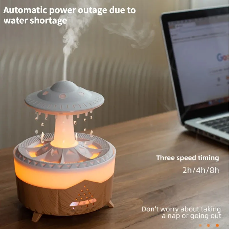 White UFO-shaped humidifier with water droplets creating mist and rain sounds