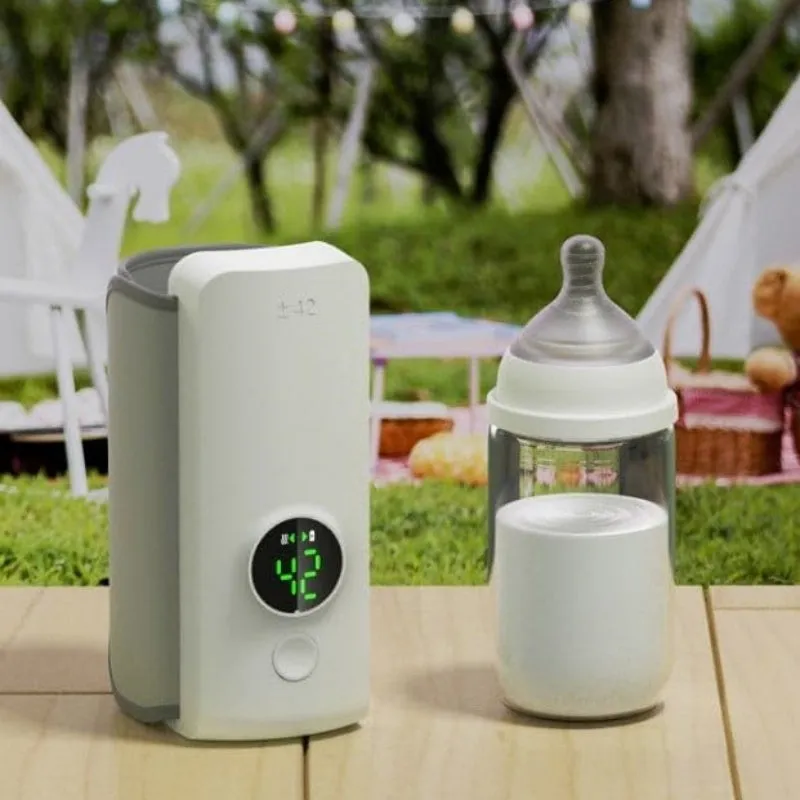 Grey non-woven portable baby bottle warmer with USB charging cable wrapped around a feeding bottle.