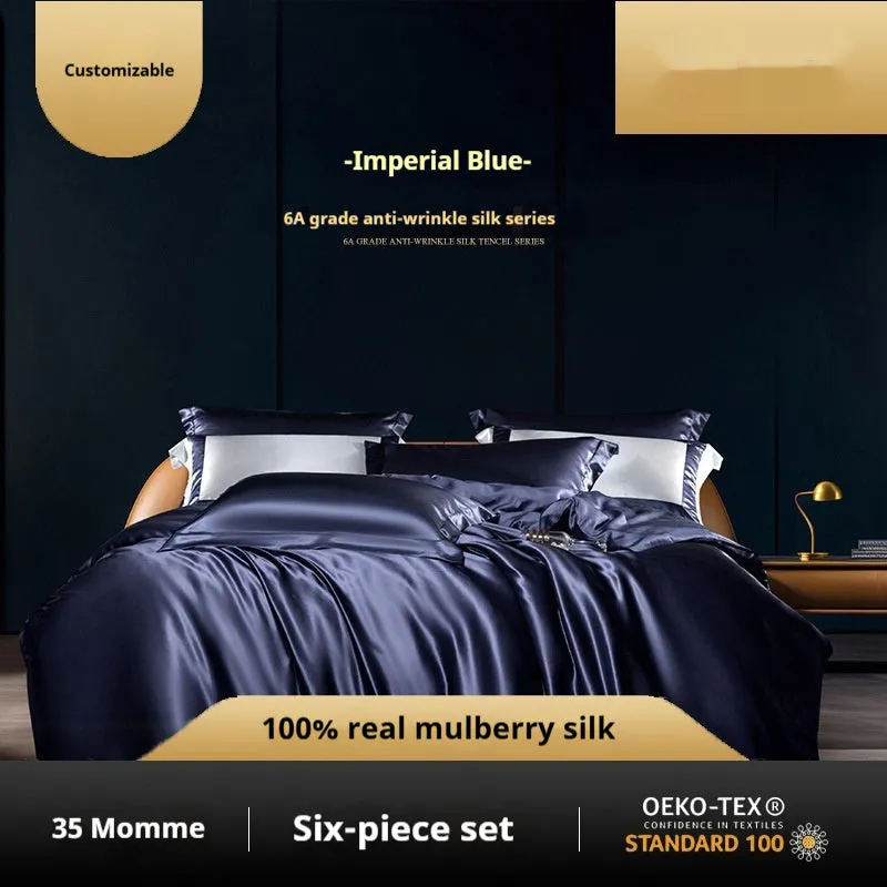 Household Fashion solid colour silk quilt cover and pillowcases on a bed, in a shade of Imperial Blue.