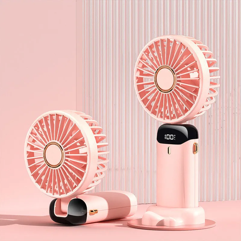 Blue portable handheld electric fan showing foldable design, LED display, and included neck lanyard