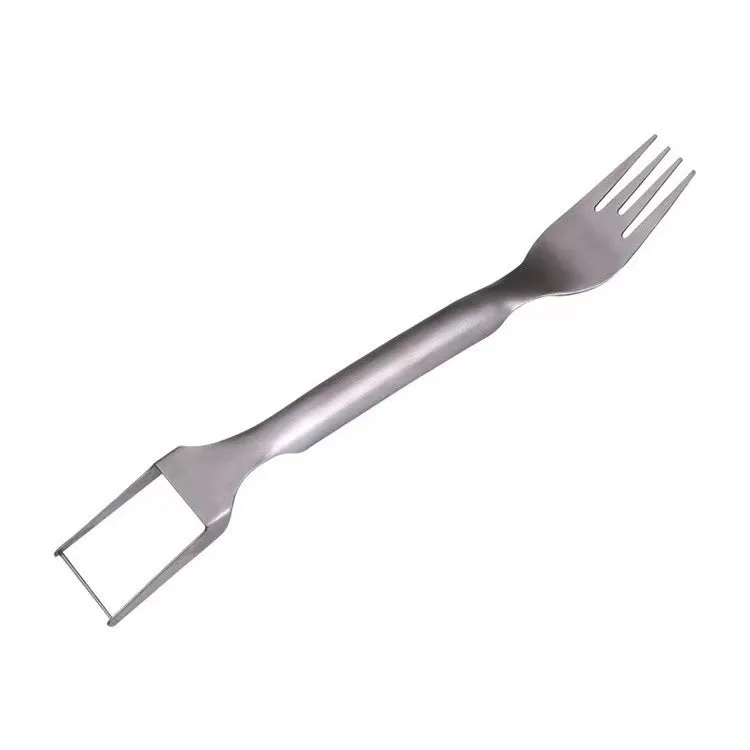 Stainless steel watermelon slicer and fork tool on a kitchen surface