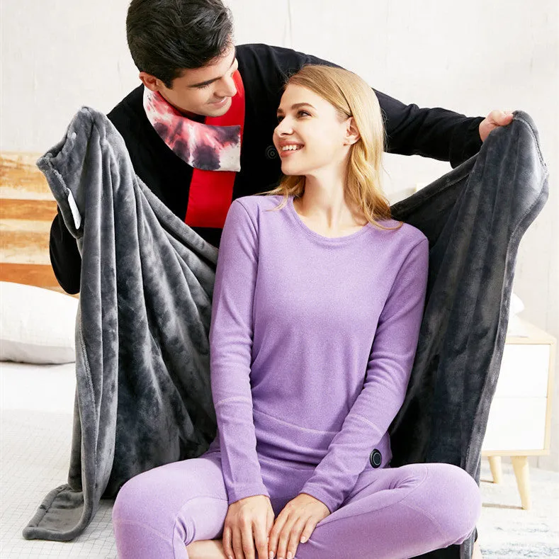 Grey coral fleece USB heated blanket showing carbon fibre heating elements and control button.
