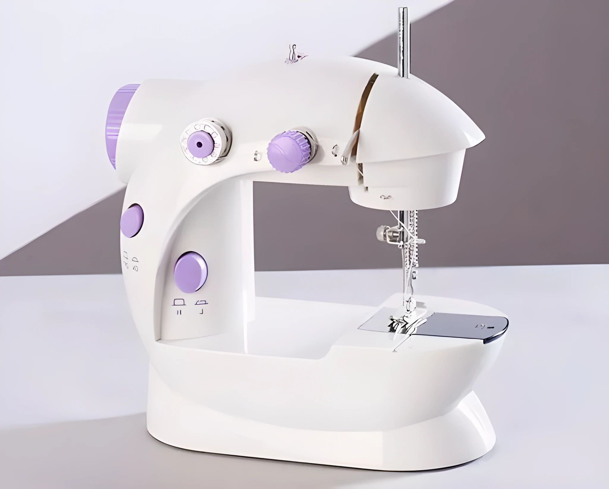 Miniature electric household sewing machine measuring 20 x 15 x 10 cm with straight stitch cylinder