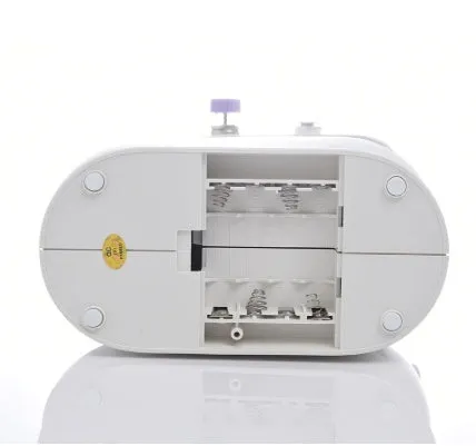 Miniature electric household sewing machine measuring 20 x 15 x 10 cm with straight stitch cylinder