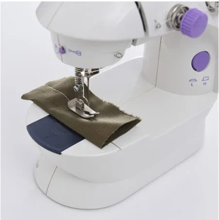 Miniature electric household sewing machine measuring 20 x 15 x 10 cm with straight stitch cylinder