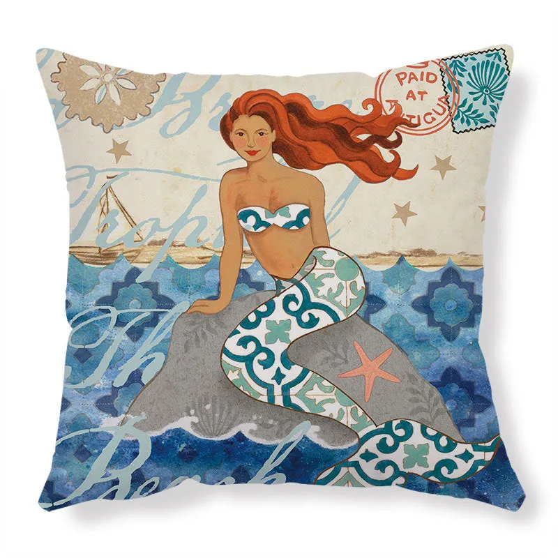 Square linen cushion cover with blue sea turtle print, showing invisible zipper closure.