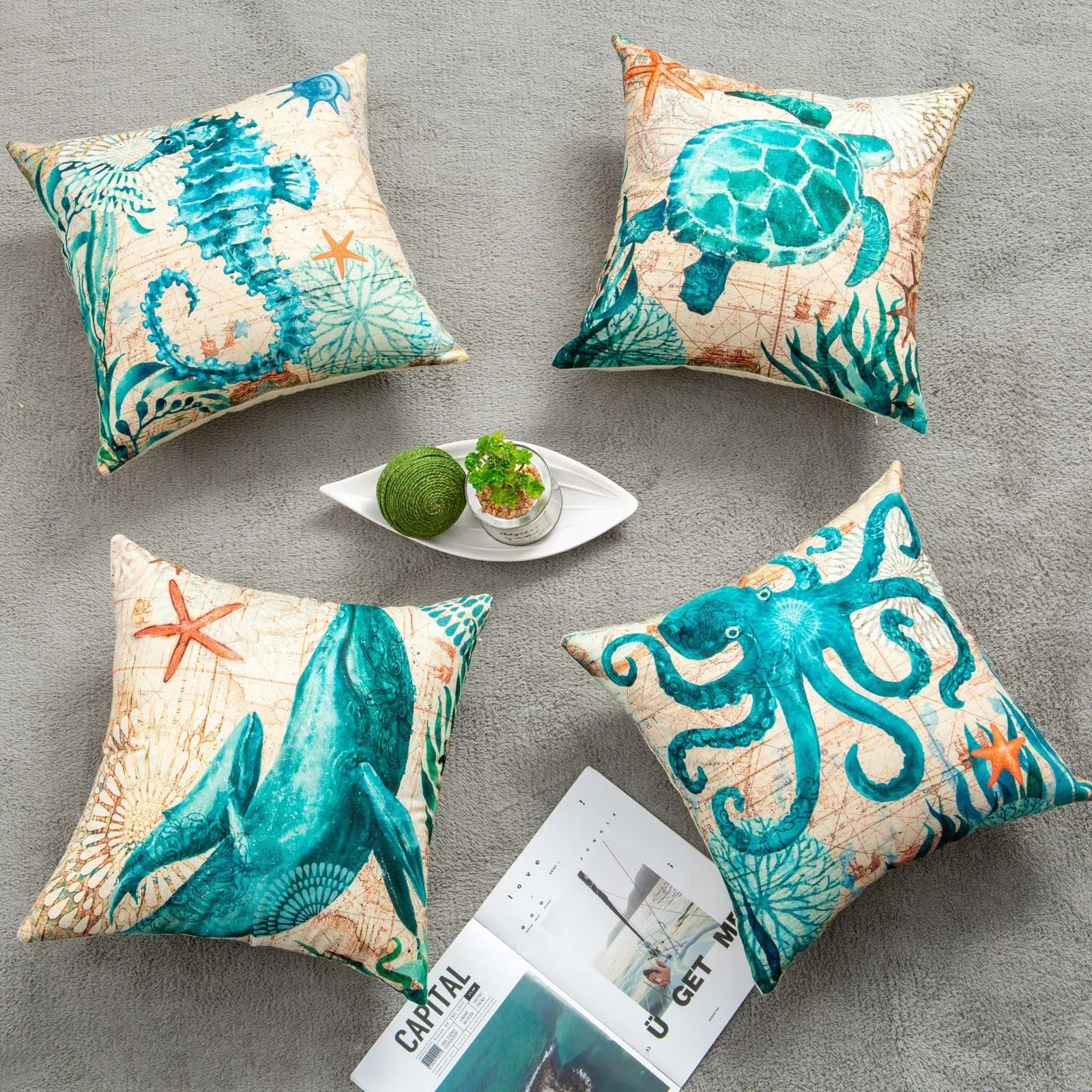 Square linen cushion cover with blue sea turtle print, showing invisible zipper closure.