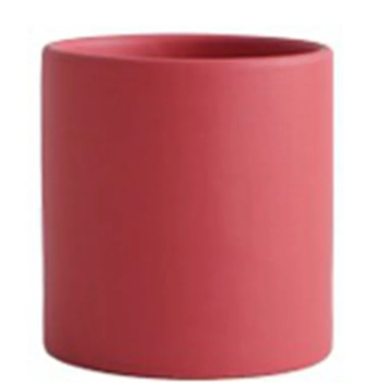 Cylindrical ceramic succulent planter with drainage hole in Nordic style, shown in a selected colour.