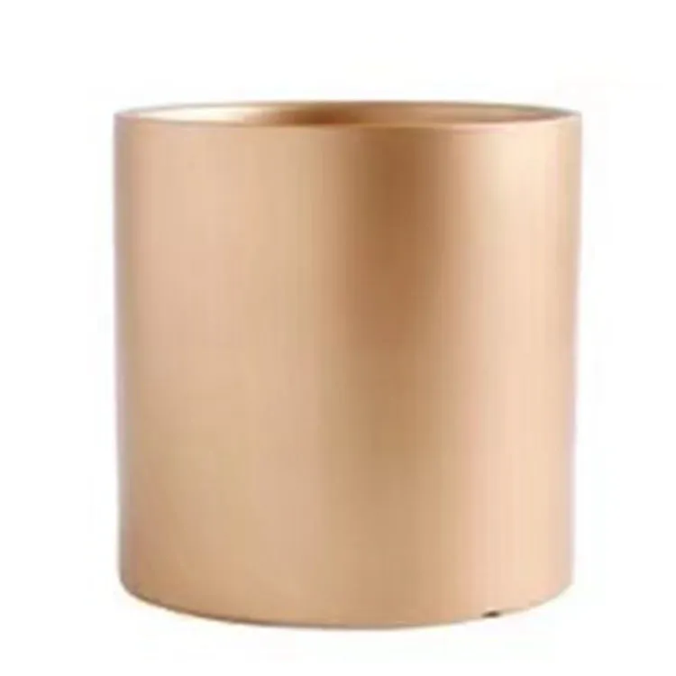 Cylindrical ceramic succulent planter with drainage hole in Nordic style, shown in a selected colour.