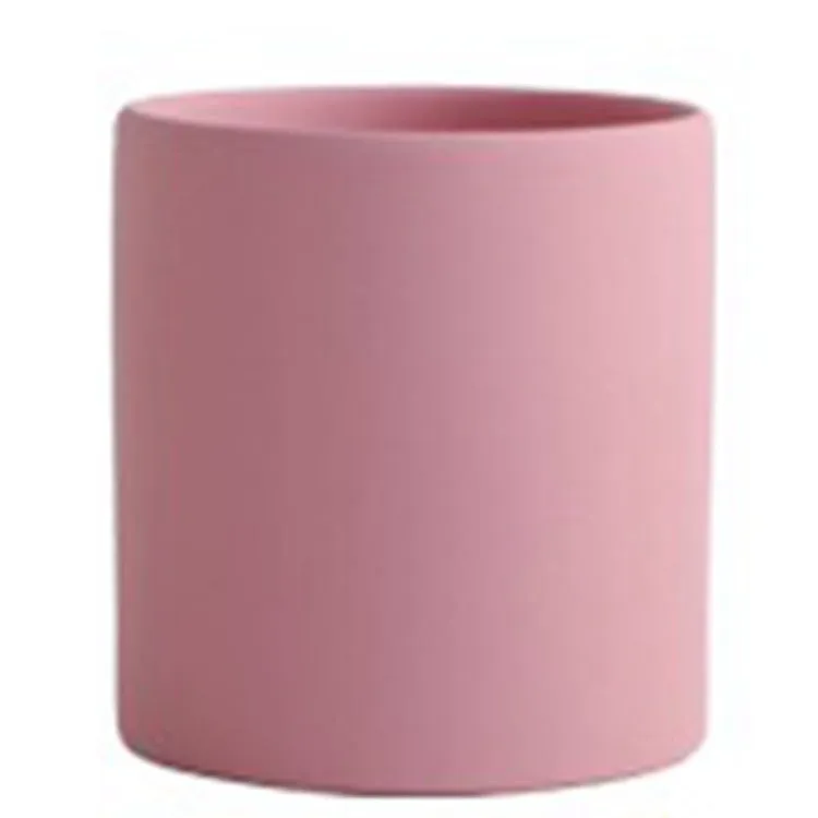 Cylindrical ceramic succulent planter with drainage hole in Nordic style, shown in a selected colour.