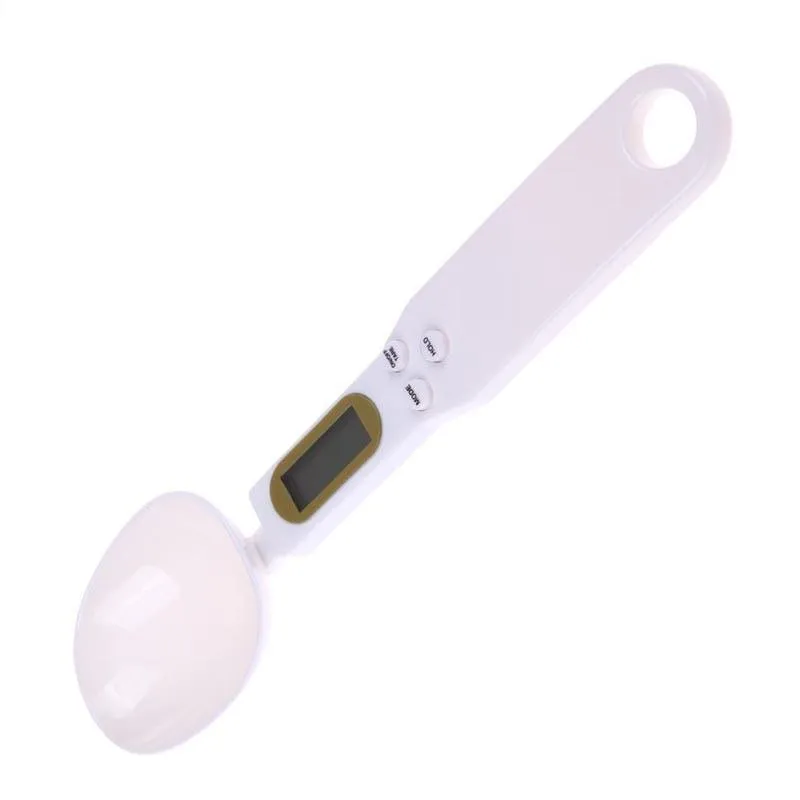 White digital kitchen spoon scale with LCD display showing weight measurement