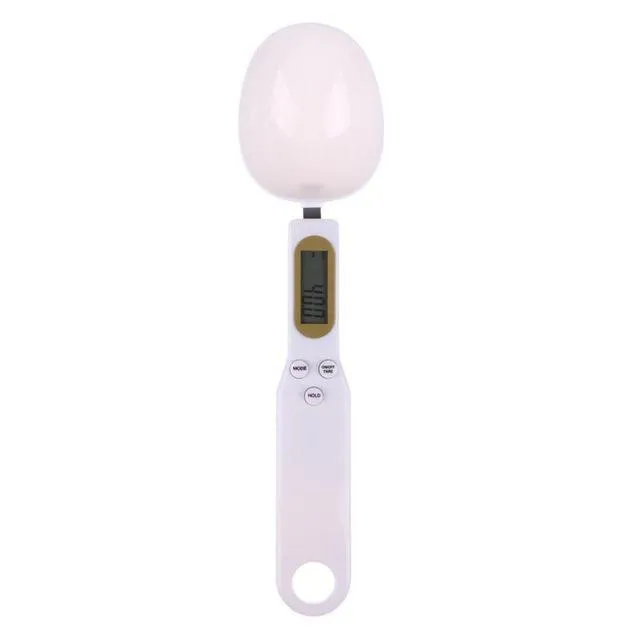 White digital kitchen spoon scale with LCD display showing weight measurement