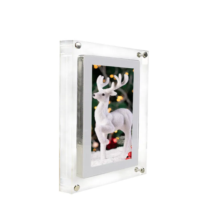 White acrylic digital picture frame with 5 inch vertical screen on a table