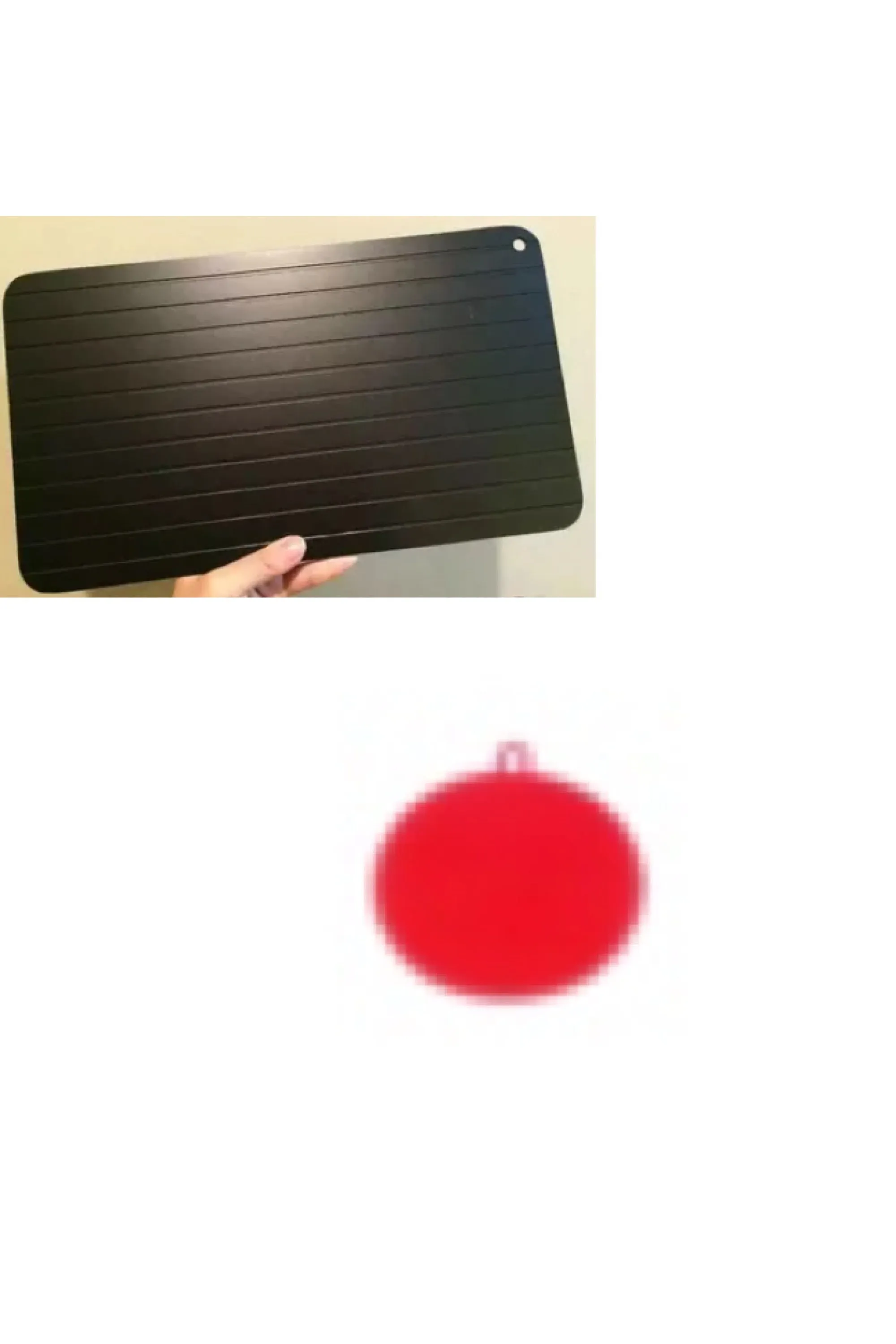 Black aluminium quick defrosting tray for thawing frozen meat and food without electricity.