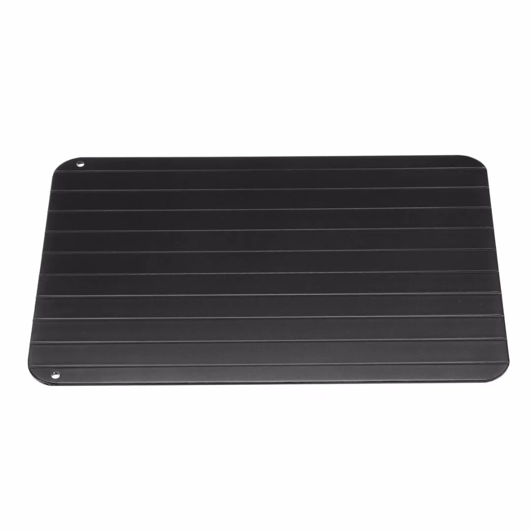 Black aluminium quick defrosting tray for thawing frozen meat and food without electricity.